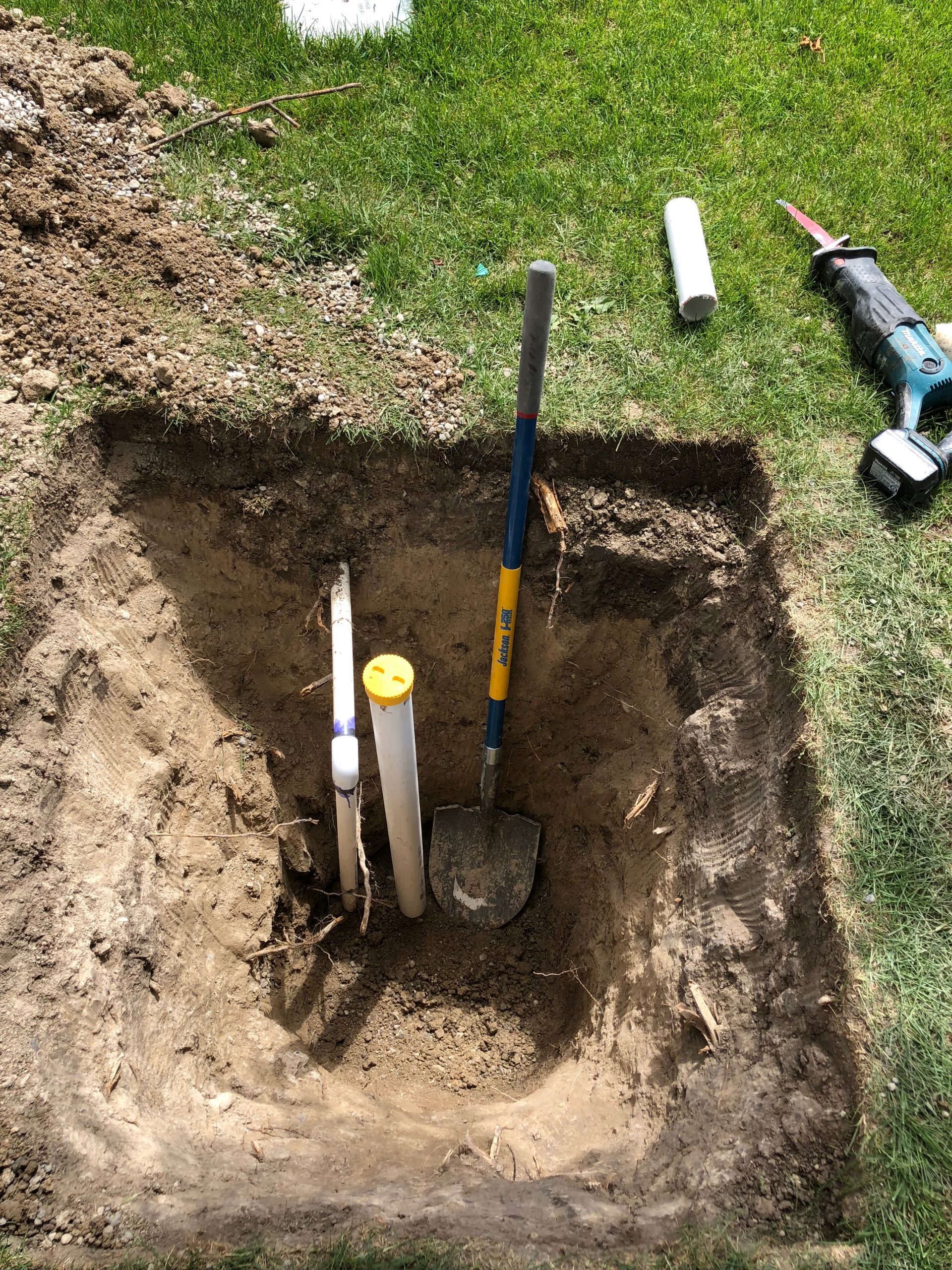 Digging Holes For Sprinklers.